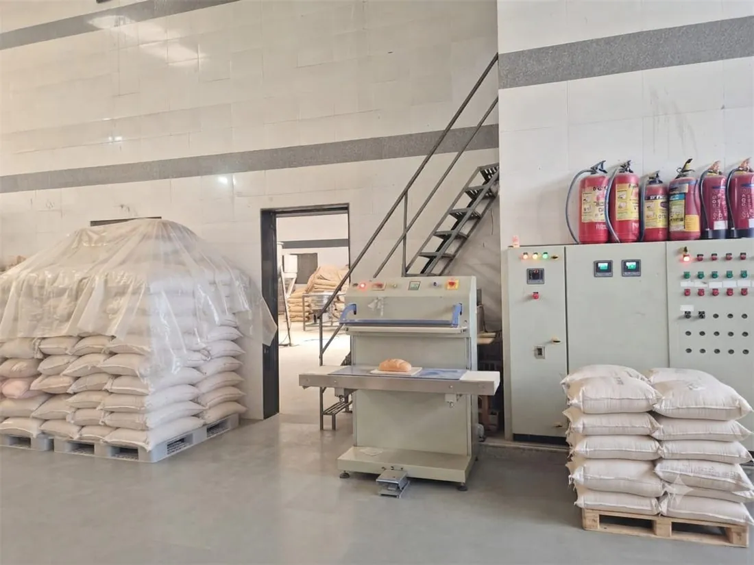 Bag sealing and weighing station at a partner processing facility